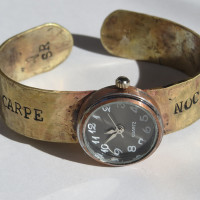Carpe Noctem brass watch closeup